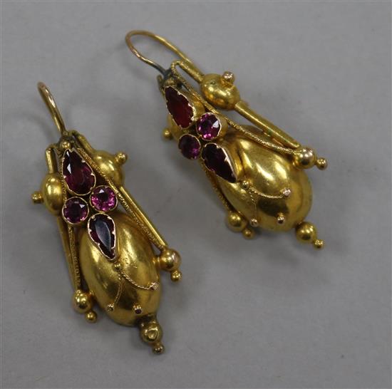 A pair of Victorian yellow metal and garnet set tapered earrings, overall incl. wire 40mm.